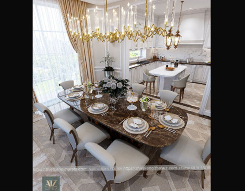 Các kiến trúc sư ATZ LUXURY đã thiết kế một bộ bàn ăn sang trọng làm điểm nhấn của phòng bếp trong biệt thự tân cổ điển 