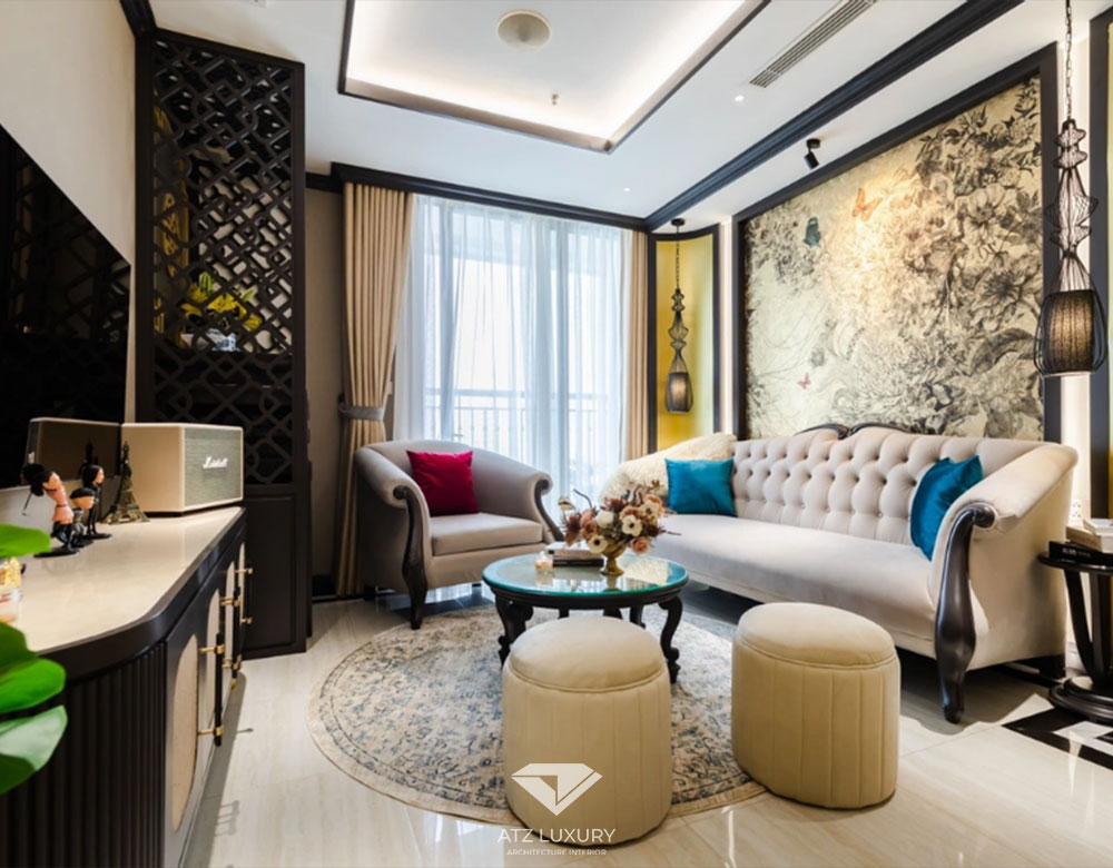Phòng khách và tổng thể căn hộ chung cư 100m2 phong cách đông dương này sử dụng gam trắng – đen xám làm chủ đạo Phòng khách và tổng thể căn hộ chung cư 100m2 phong cách đông dương này sử dụng gam trắng – đen xám làm chủ đạo