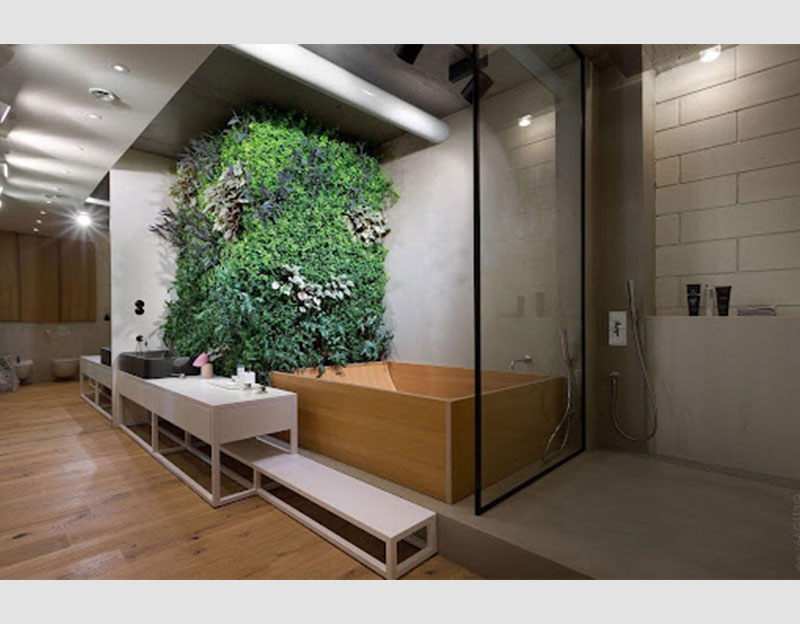 Mẫu 20: Thiết kế và decor phòng tắm với tường cây giả đem lại không gian xanh cho phòng tắm. Xu hướng trang trí cây giả đang là hot trend trong trang trí các khu vực không gian biệt thự hiện đại năm 2022