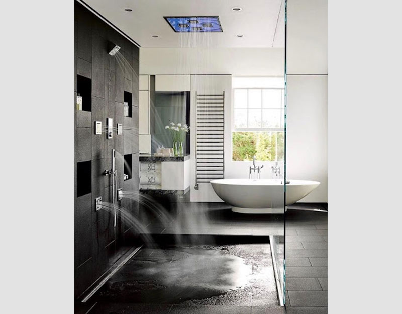 Mẫu 1: Phòng tắm biệt thự hiện đại với hệ thống vòi hoa sen nhiều vị trí đem lại cho bạn cảm giác như đang tắm dưới dòng suối. Vật liệu kính giúp không gian sáng thoáng, mát lành.