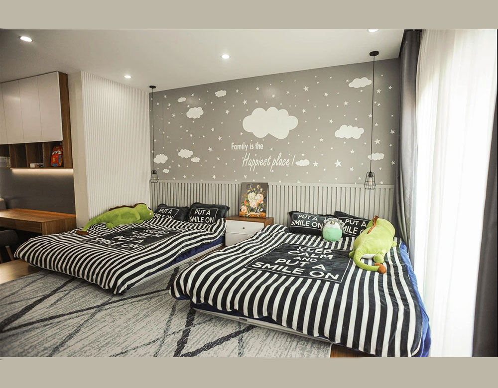 Phòng ngủ của con trong mẫu thiết kế căn hộ 100m2 2 phòng ngủ gồm 2 giường đơn