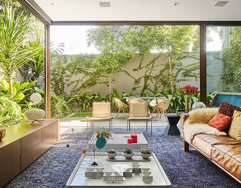 Trong mẫu thiết kế này, phòng khách được thiết kế mở, không gian gần gũi với thiên nhiên
