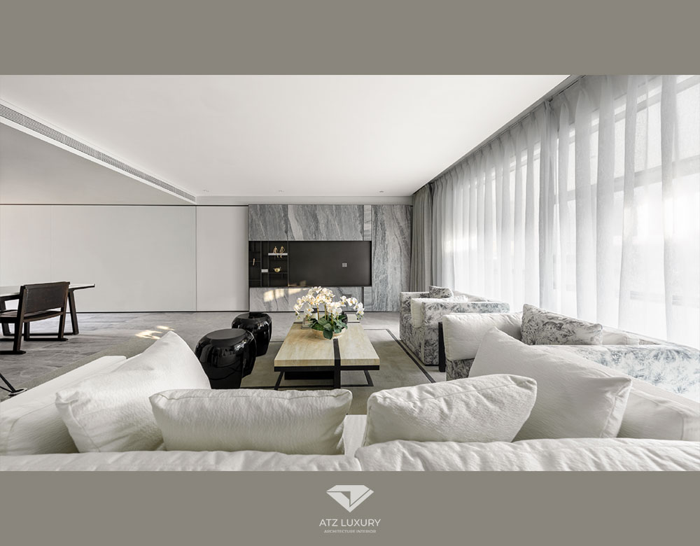 Màu trắng chủ đạo bao trọn phòng khách trong thiết kế nội thất biệt thự 220m2