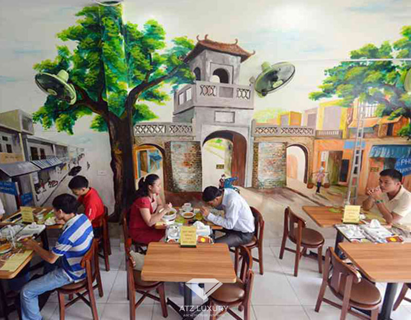 Mẫu 9: Mẫu nhà hàng, quán phở bình dân mộc mạc và ấn tượng nhờ những bức tường trang trí là những bức tranh tự vẽ về cảnh làng quê, con người Việt xưa